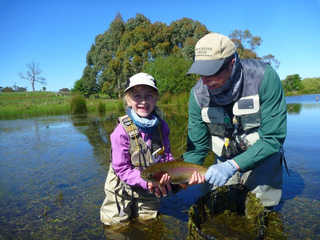 8 y/o Matilda was thrilled with her first trout on the fly, but soon after she wanted to go and 'tie some knots'; despite a stream of good fish swimming past us!  