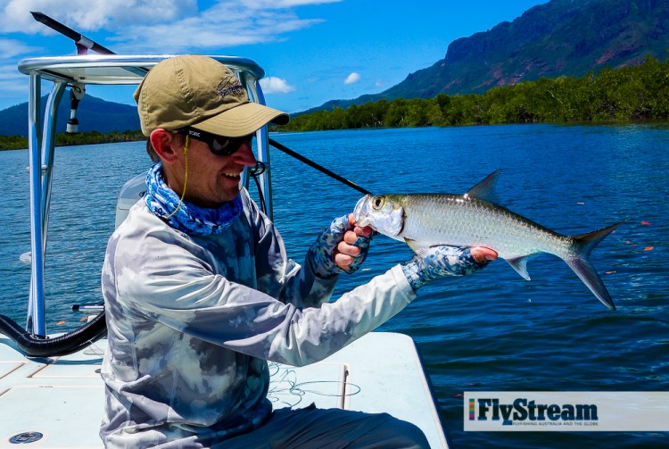 FlyLife's Brad Harris holds a nice baby tarpon before release.