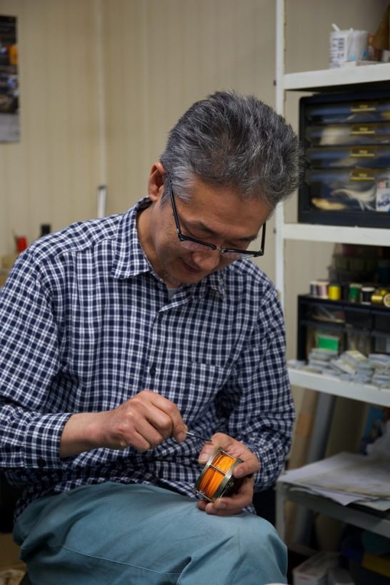 Reel maker Akihro Nakashima admires Jeff Wagner's work.